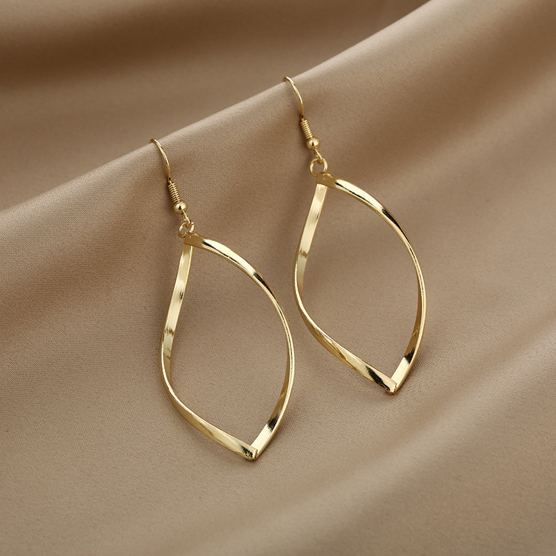 Shiny geometric alloy earrings with electroplated finish - Main product view