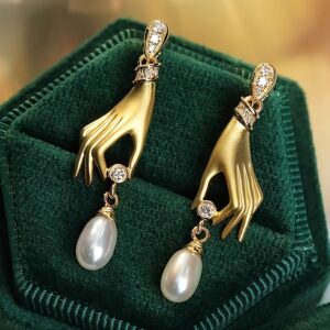 Geometric zircon palm pearl pendant earrings with an electroplated alloy finish - Main product view