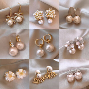 Women's fashion pearl earrings in assorted decorative styles - Main product view