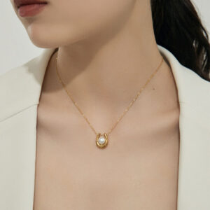 Gold-tone U-shaped pearl pendant necklace with geometric titanium steel chain - Main product view