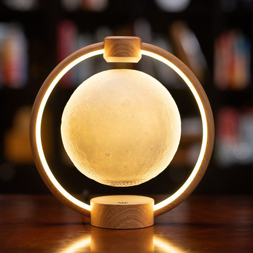 K1 floating moon Bluetooth speaker with rotating sphere, colorful lights, and wooden base - Product view 1