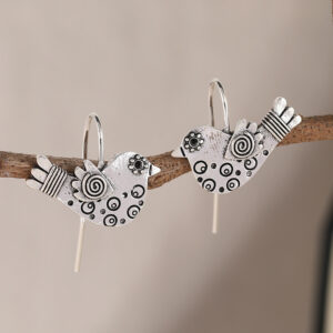 Women's large silver-tone circular hoop earrings with bohemian styling - Main product view