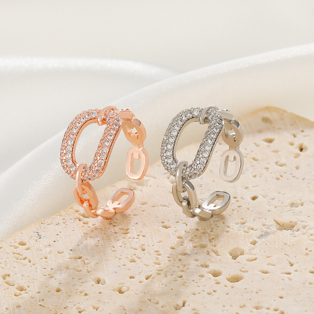 Open-ended geometric micro-inlaid ring with ellipse and quadrilateral details - Main product view