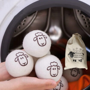White 100% wool dryer ball with lamb pattern - Main product view