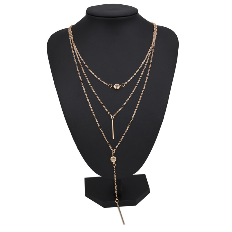 Minimalist geometric bar necklace with small dot details in gold or silver - Product view 2
