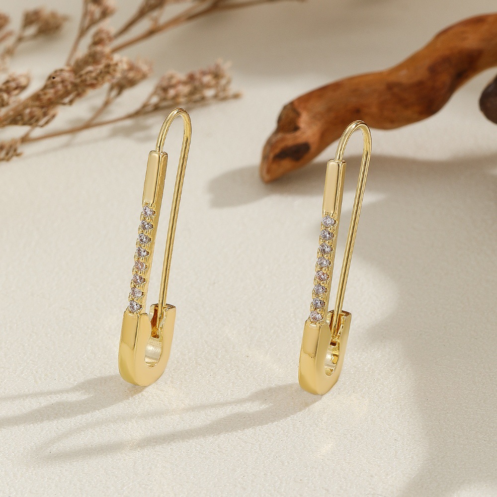 Geometric zircon-style pin clip earrings in a polished metallic finish - Product view 5