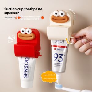 Plastic suction cup toothpaste squeezing stand in cream or red - Main product view