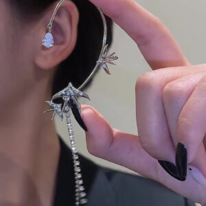 Flying swallow single-ear earring with zircon-style detail in gold or silver finish - Main product view