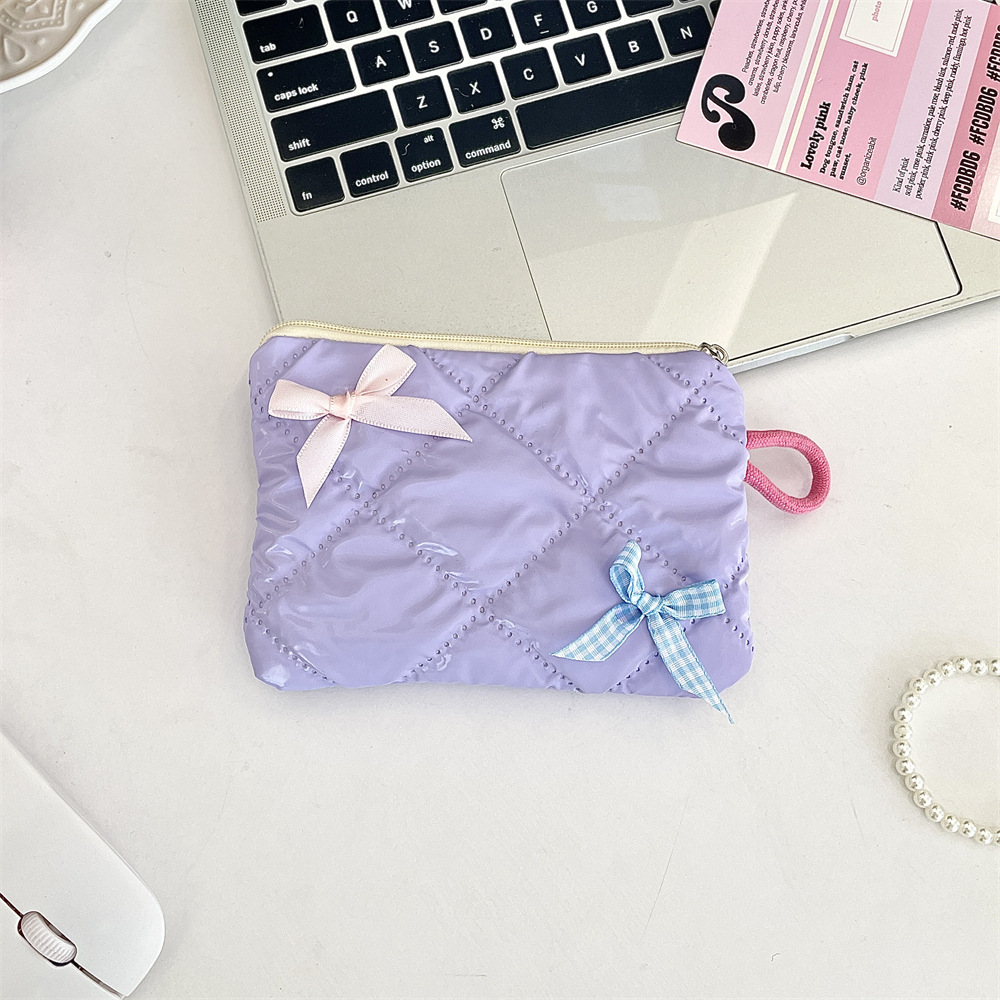 Glossy pearl-style plaid bow coin purse in a soft pastel color - Product view 5