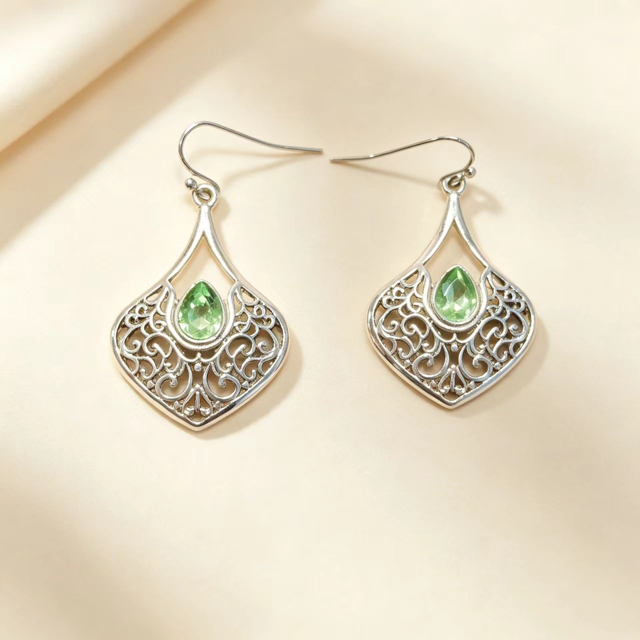 Vintage silver-tone hollow-pattern teardrop earrings - Main product view