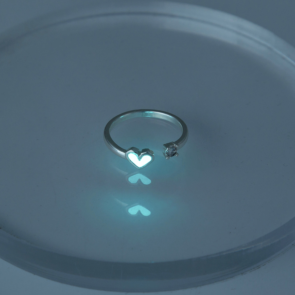 Glow-in-the-dark open-heart adjustable copper ring in blue - Main product view
