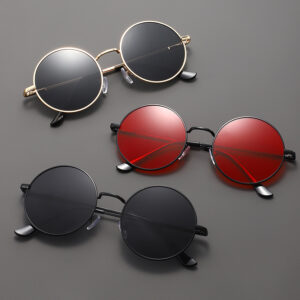 Round vintage UV400 sunglasses with a metal frame and colored lenses - Main product view