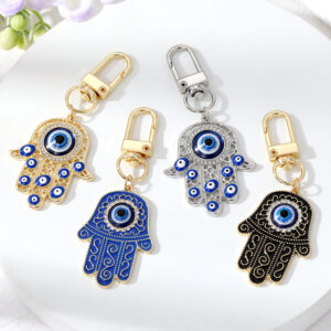 Vintage alloy palm pendant keychain in a decorative national-style design - Main product view