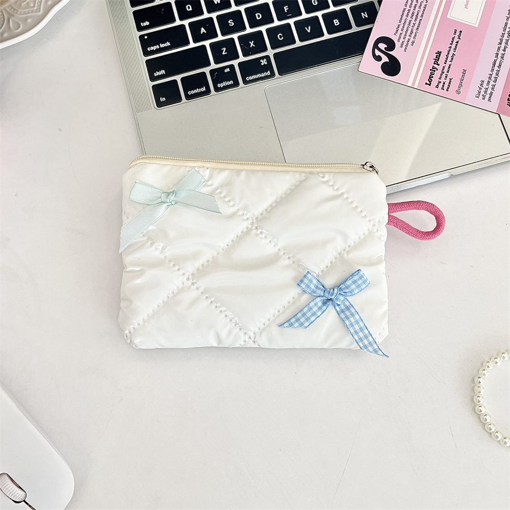 Glossy pearl-style plaid bow coin purse in a soft pastel color - Product view 8