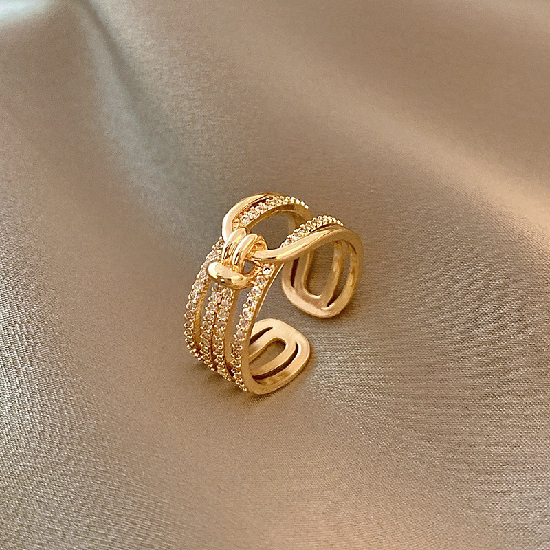 Adjustable micro zircon fashion ring in gold, silver and rose gold finishes - Main product view