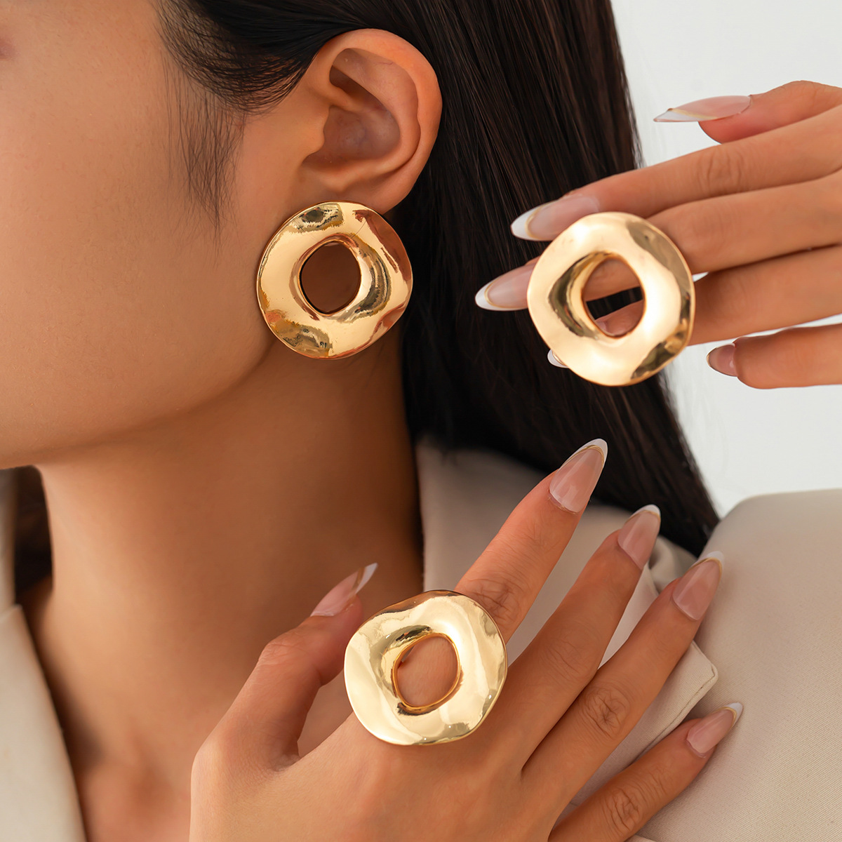 Glossy irregular hollow round earrings with matching ring set - Main product view