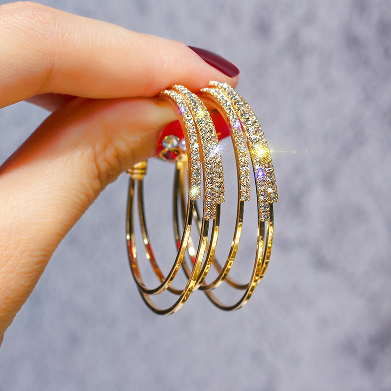 Geometric circle statement earrings in gold, silver, and rose gold - Main product view