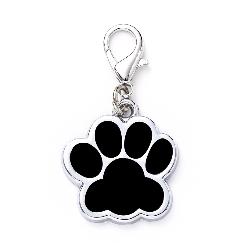 Glitter paw-print metal dog tag in a colorful finish - Main product view