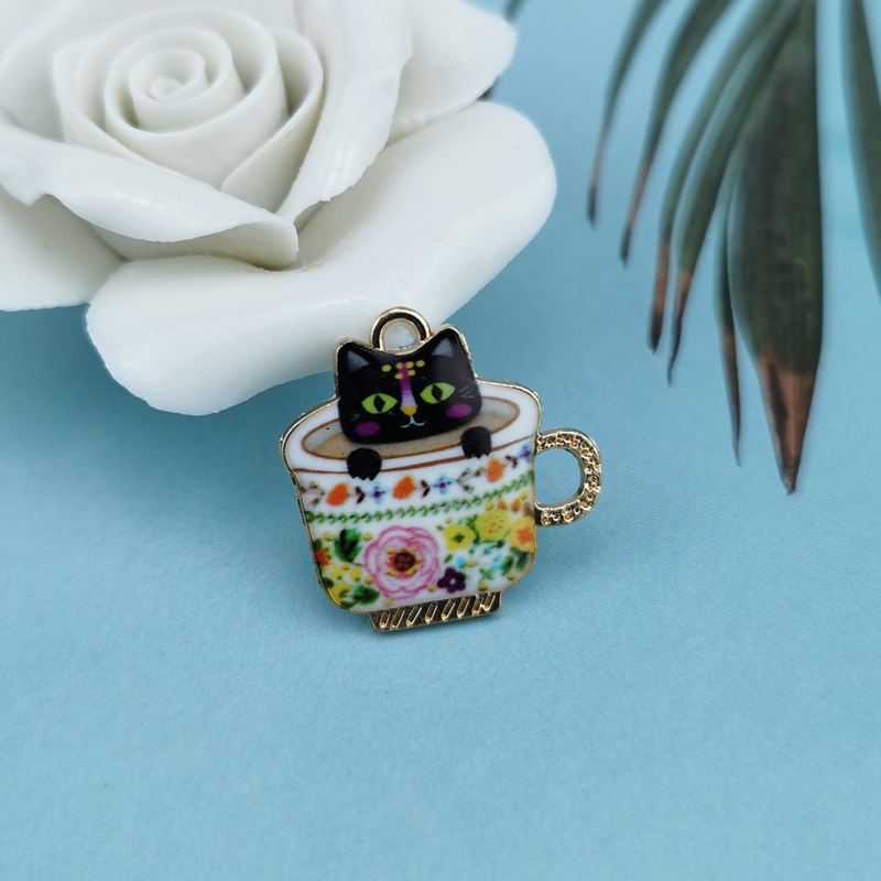 Teacup cat alloy pendant with drip-oil finish in black or blue - Main product view