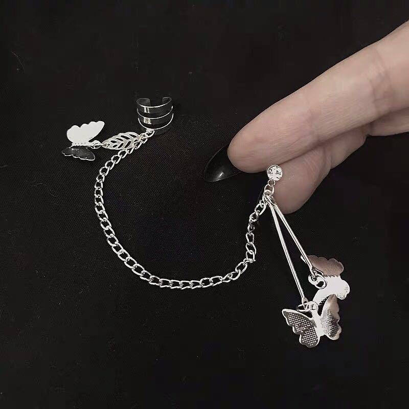 Women's butterfly earrings or ear clips with geometric tassel-inspired details - Product view 4