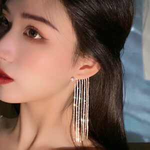 Long geometric tassel earrings in gold or silver - Main product view