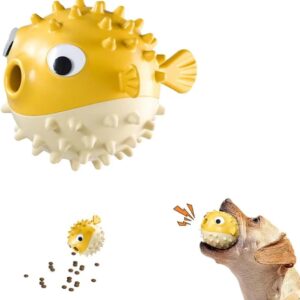 Fish-shaped interactive treat dispensing dog chew toy in assorted colors - Main product view