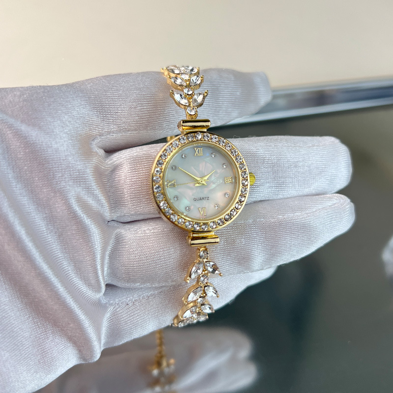 Adjustable quartz bracelet watch with a 26mm dial in gold, white chrome and rose gold - Gold