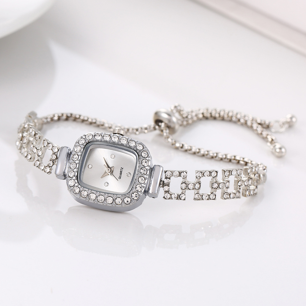 Retractable bracelet quartz watch with elegant decorative accents - Silver