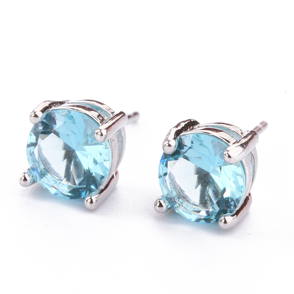 Geometric four-prong zircon stud earrings for women in a selected color - Lake Blue