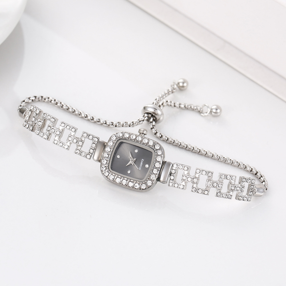 Retractable bracelet quartz watch with elegant decorative accents - Silver Black
