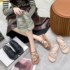 Women’s Roman-style low-top PVC sandals in black and apricot - Main product view